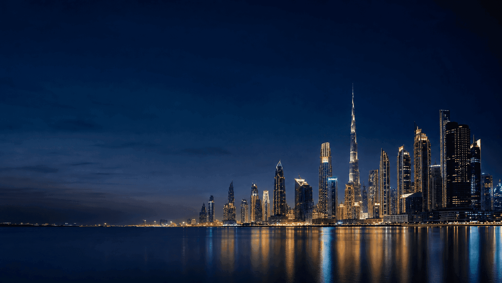 Dubai skyline at night, viewed from the water